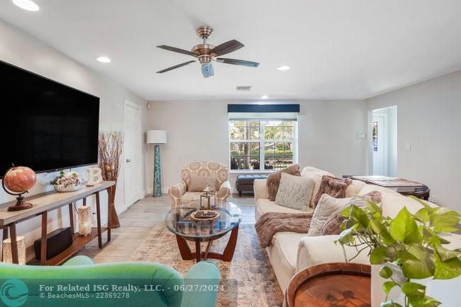 Living flows easily into dining and kitchen area