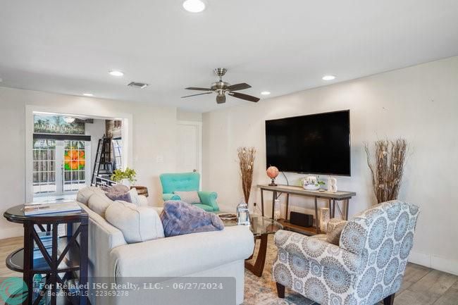 Living flows easily into dining and kitchen area