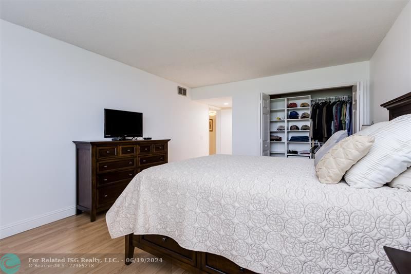 Master Bedroom has 3 closets, one double closet with custom storage, one linen closet and a walk-in closet