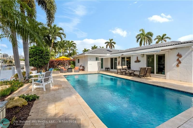 Heated, Salt Filtration Pool with Travertine Deck, Retractable Shade Awnings