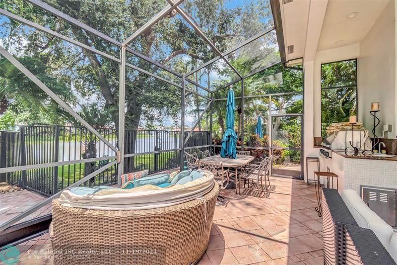 Inviting Screened & Covered Outdoor Kitchen, Entertaining & Relaxation Area!