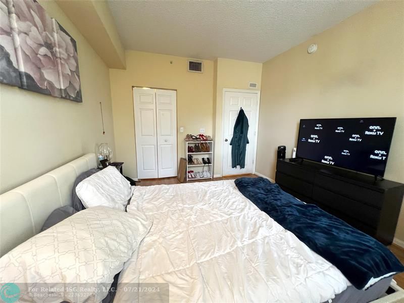 Bedroom with walk in closet