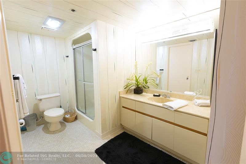 En suite bathroom and guest bathroom