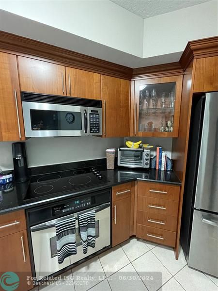 Granite counters, stainless appliances.  Room for a breakfast table.