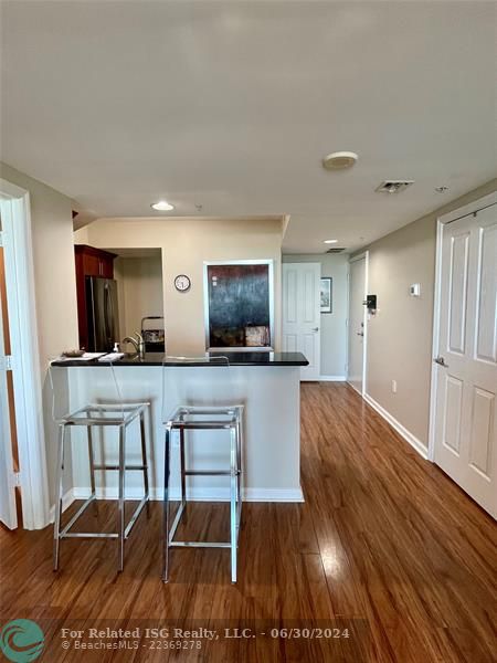 Granite counters, stainless appliances.  Room for a breakfast table.