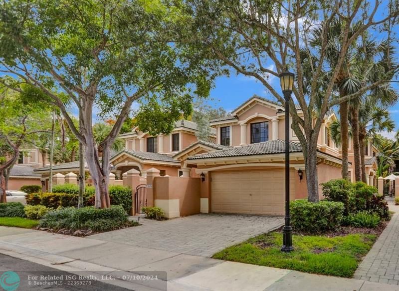 Brick paver driveway, spacious 2 car garage with ramp to interior, hence ADA accessible.