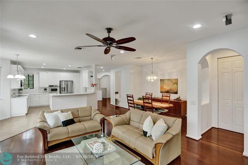 Open floor plan of family, dining and kitchen. Extra linen closet in the entry niche to master suite.