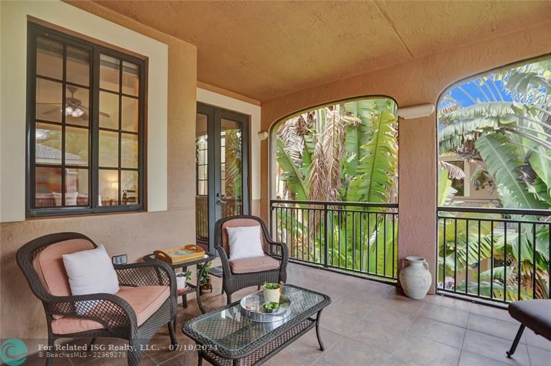 French doors from master suite to lush, private patio.