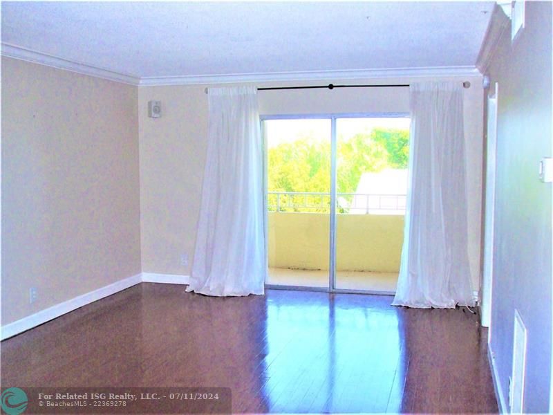 Living Room opens to east facing terrace which is ideal for sunrises and outdoor dining.