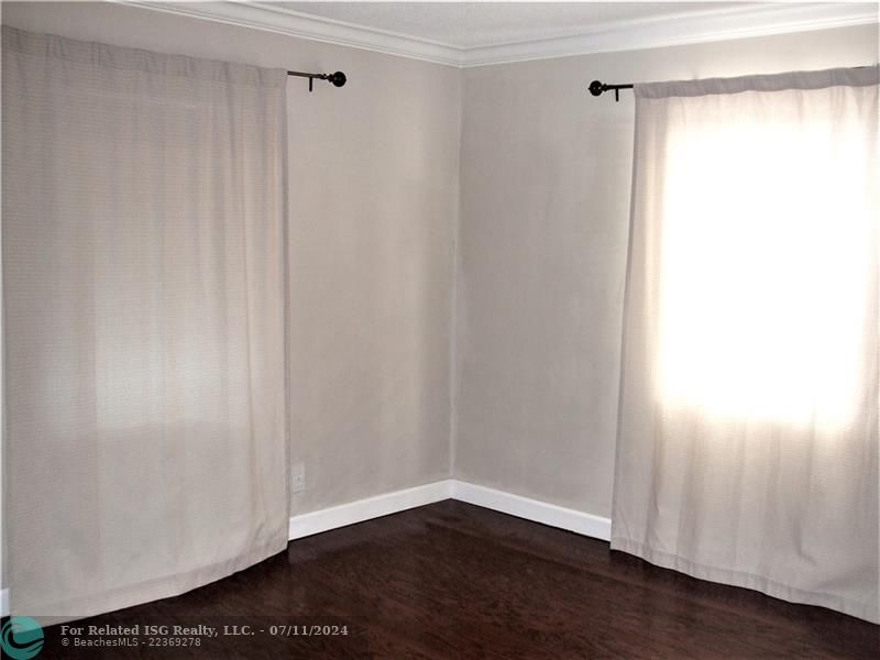 Southeast facing light and bright corner Master Bedroom.