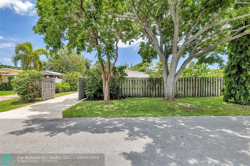 Front of structure - Travertine Driveway  Private, fenced-in yard