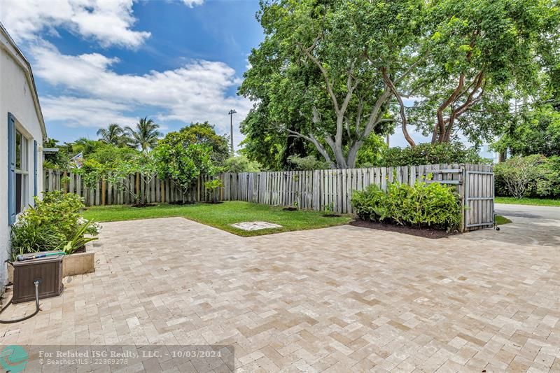 Large travertine front patio