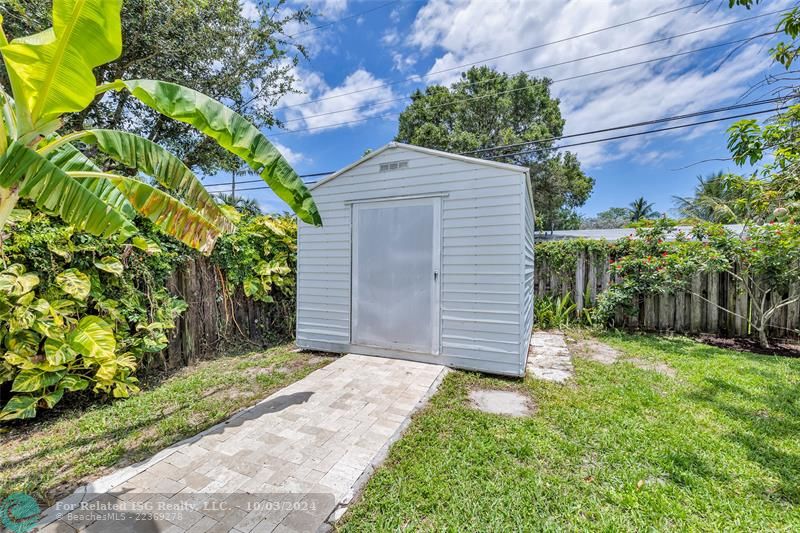 Shed with AC and electric.  Could be office, workshop, storage, etc.