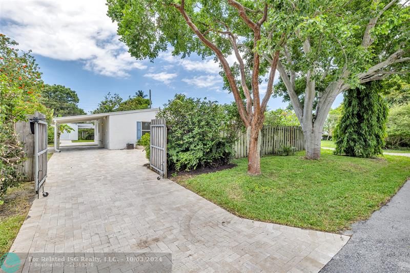 Long driveway and carport.  Room for a RV, boat or multiple cars.