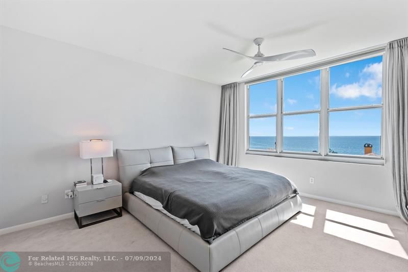 Primary bedroom with ocean views