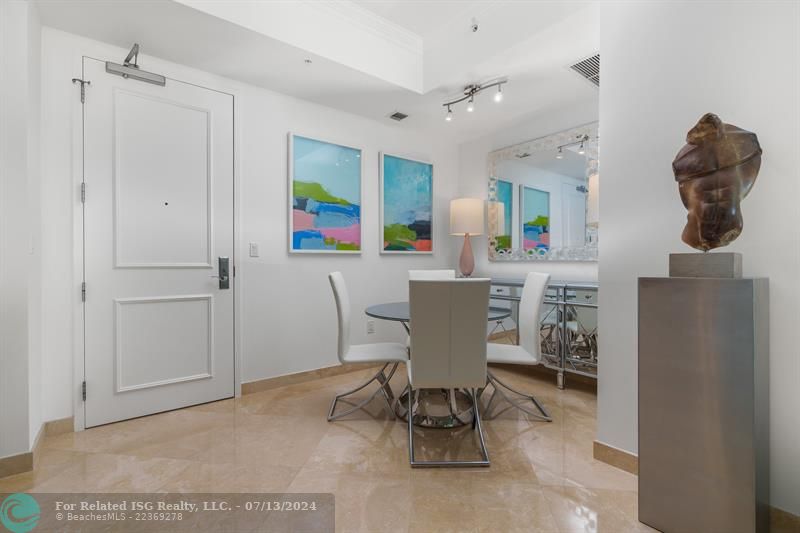 Separate Dining Area  adjacent to the entry and opposite kitchen