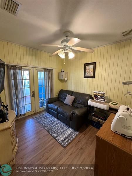 Hall leading into laundry room and Den/Hobby room