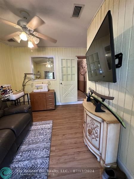 Hall leading into laundry room and Den/Hobby room