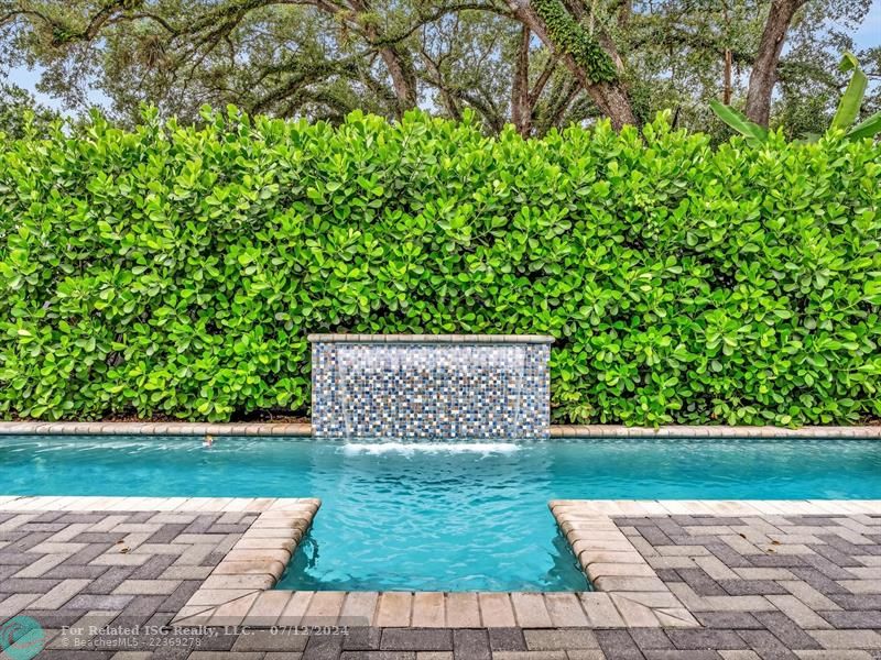 Heated pool with stay in place SWIM JETS and waterfall.