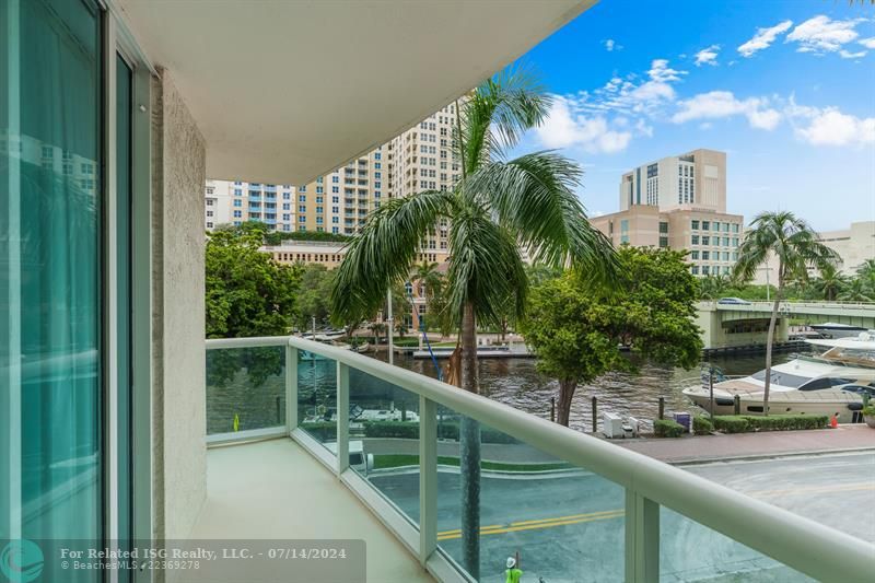 Enjoy fabulous tropical River & sunset views from the balcony off of the Master Bedroom