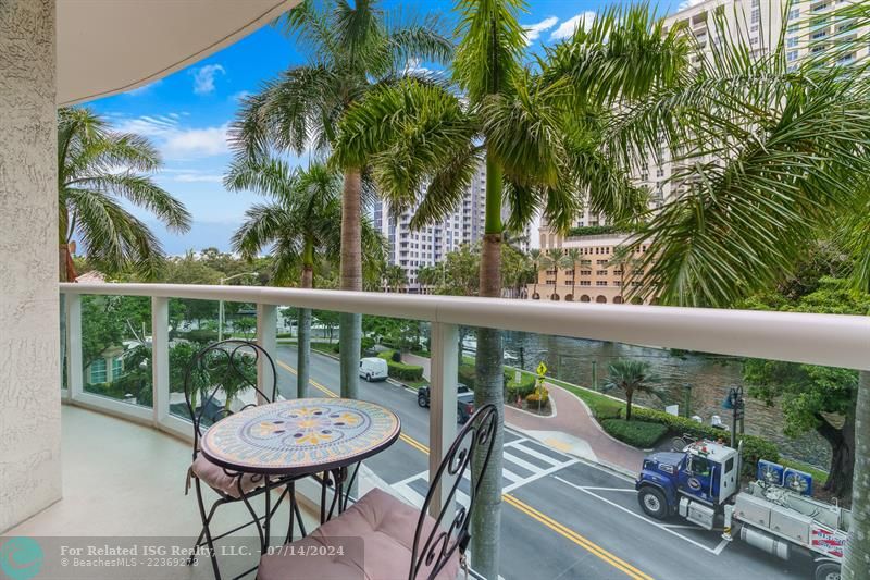 Enjoy fabulous tropical River & sunset views from the balcony off of the Master Bedroom