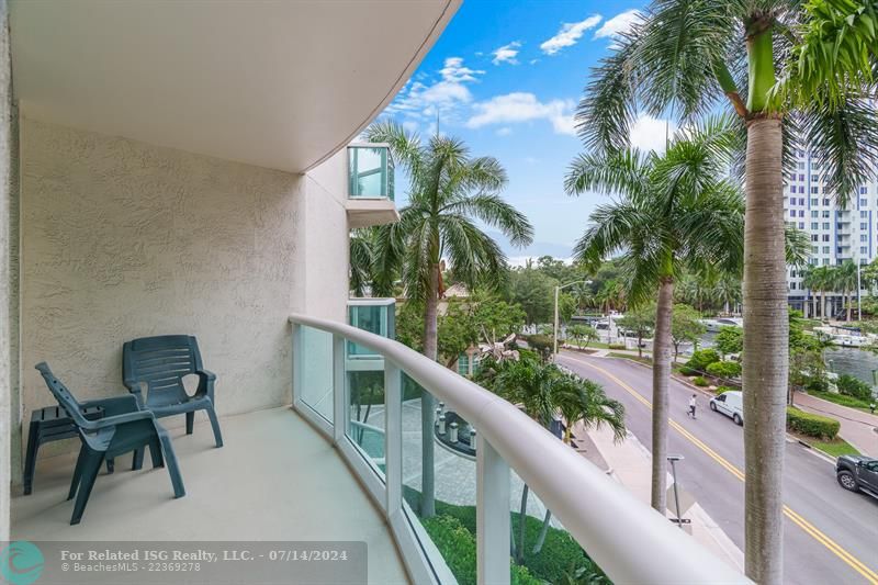 Enjoy fabulous tropical River & sunset views from the balcony off of the Master Bedroom