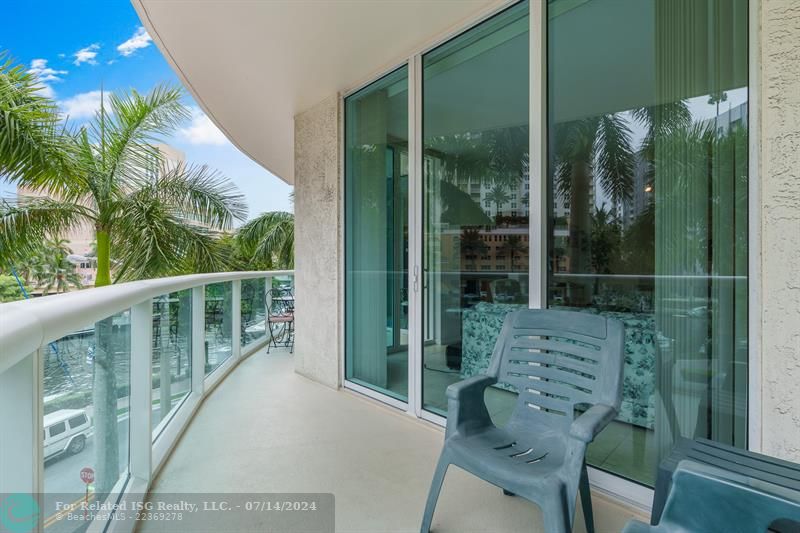 Enjoy fabulous tropical River & sunset views from the balcony off of the Master Bedroom