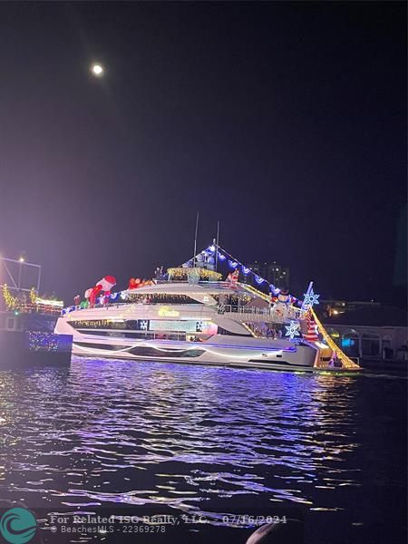 Holiday boat parade from marina walkway