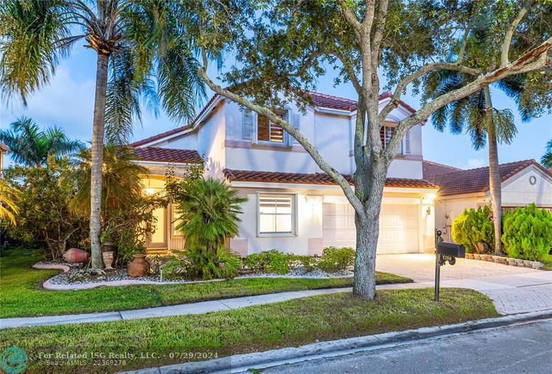 Mature landscaping framed the home, creating lovely curb appeal.