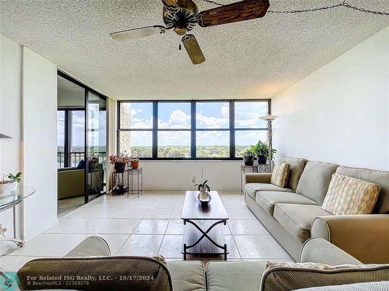 Spacious Family Room w ceiling fan and view