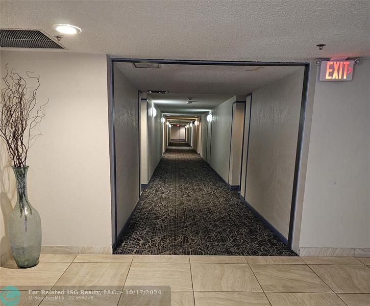 Indoor hallway to unit