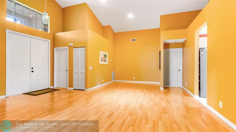 double door entry - dining room, volume ceilings