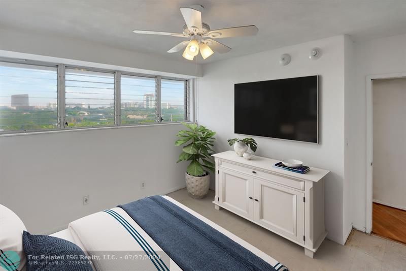 Bedroom 3 has been professionally staged and photographed to showcase its full potential and demonstrate how beautiful and functional the apartment can be.