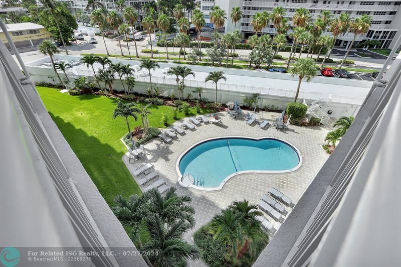 View of the pool from the large L shape balcony