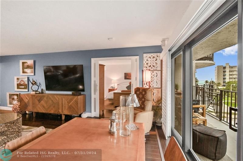 Dining area looking onto balcony