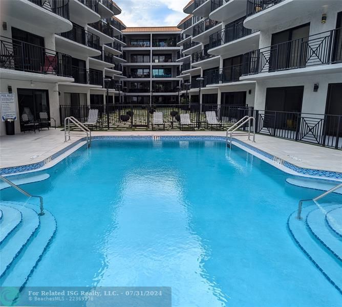 Courtyard behind pool