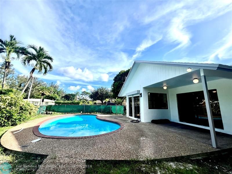 Covered patio view from the dock, looking at the pool