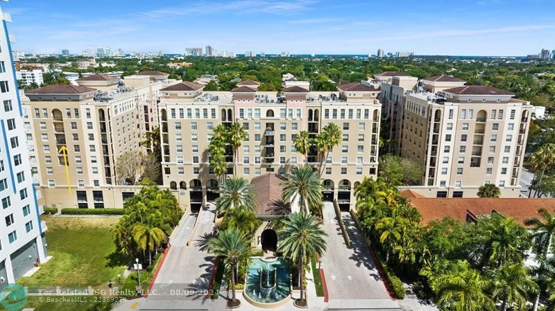 Main entrance to 520 SE 5 Avenue    Las Olas by the River   Yellow arrow on left side of photo points to unit's second balcony