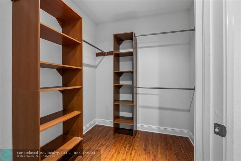 Primary suite walk-in closet.