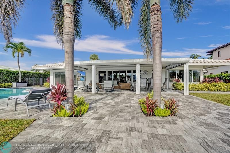 Lanai with hurricane impact electric shutters