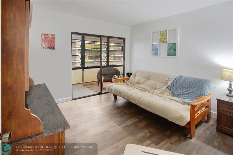 Guest bedroom with patio access