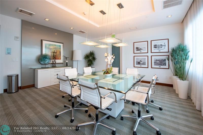 conference room with catering kitchen behind