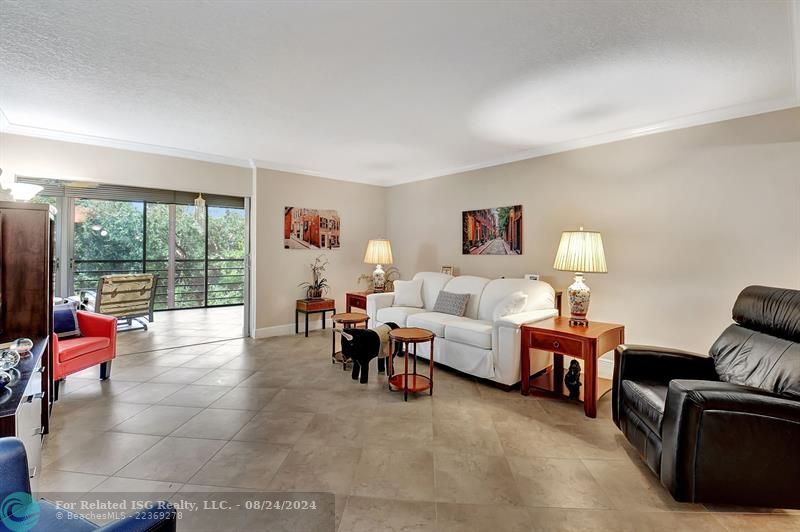 Formal Living Room open to Air Conditioned Patio Area!