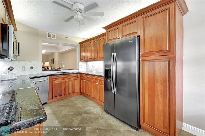 Kitchen Open to Formal Dining & Living Rooms Areas!