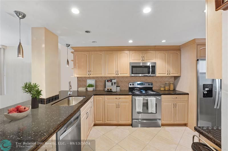 Spacious layout with ample countertops and abundant cabinetry.