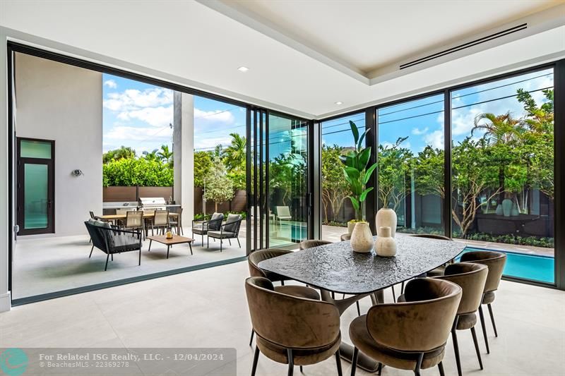 Floor to ceiling sliding glass doors.