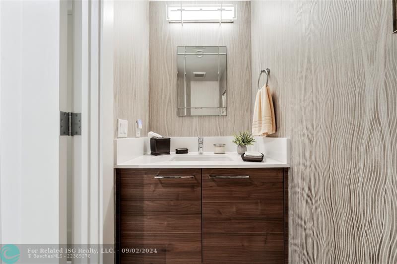 Powder room off the main entry