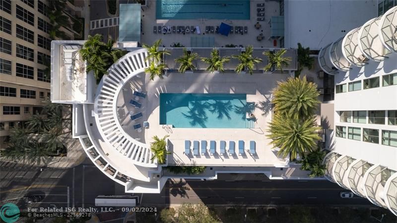 Stunning rooftop pool + cabanas + 360 views