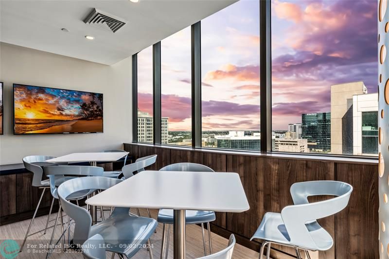 Open co-working space with city vistas. Or just a cozy spot to read with your always complimentary espresso or tea!