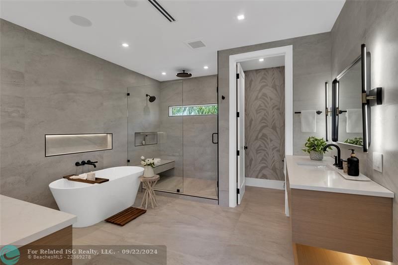 Spa like En Suite master bath with freestanding soaking tub and separate shower stall